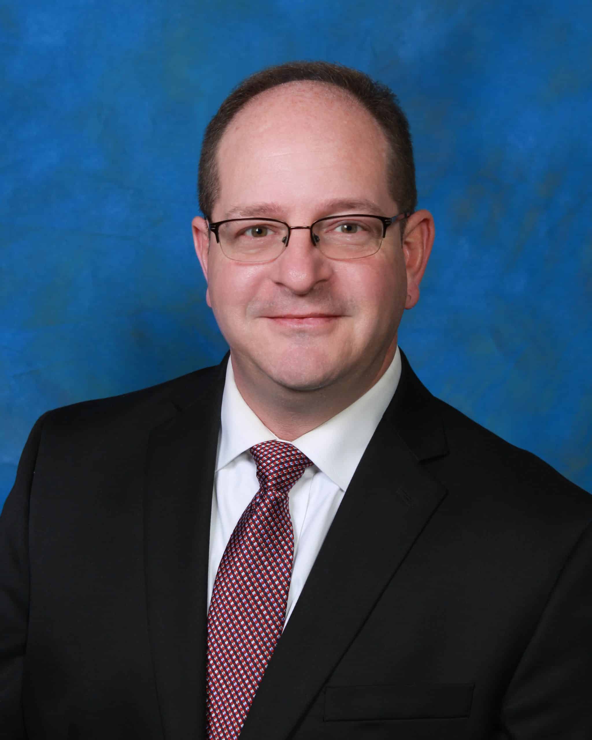 Headshot of Evansville criminal defense attorney Conor O'Daniel of the law firm Foster, O'Daniel, Hambidge & Lynch